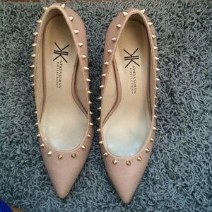 Pointy nude heels with studs