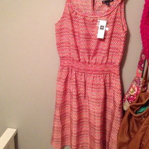 Pink, green, orange, and white zig zagged dress