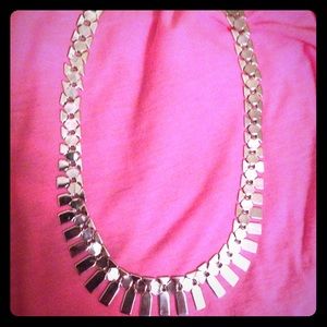 Silver statement neck