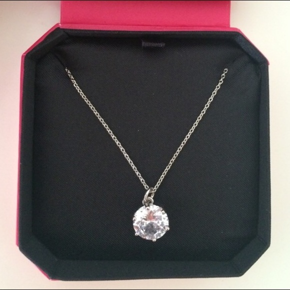 Silver band with diamond necklace.