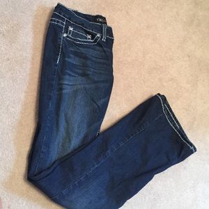 Flare jeans, white stitching, with jems on pocket