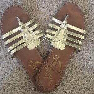 Billabong gold flip flops