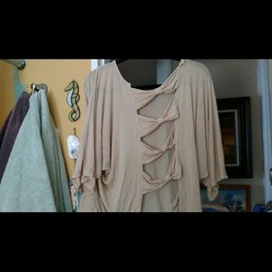 Cream top with bows on back