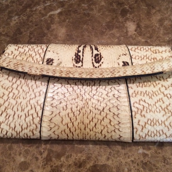 Authentic snake skin purse! Tan suede lined.