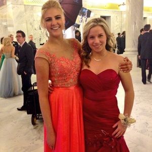 Coral, sheer top detailed prom dress. Sherri Hill.