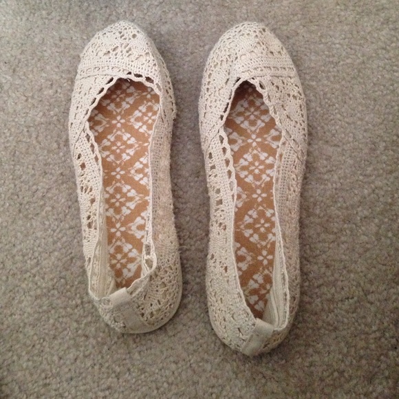 Lace slip on flats.