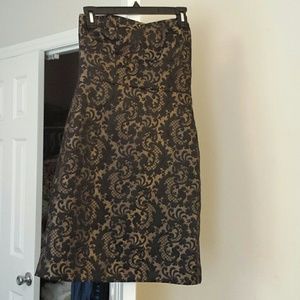 Strapless black and gold dress