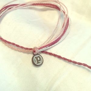 Pura Vida pink bracelet.
