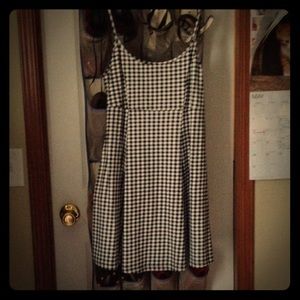 Black and white checked dress.