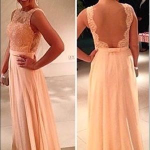 Peach colored open back prom dress