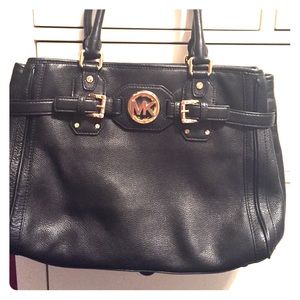Michael Kors black leather tote with gold hardware