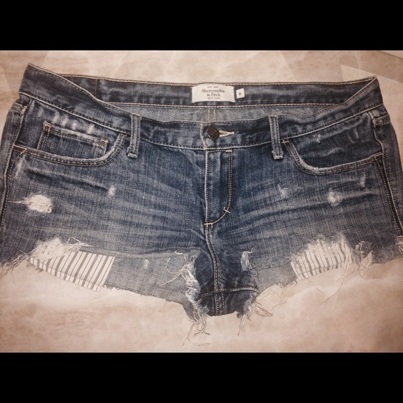 Very short Abercrombie and Fitch shorts.
