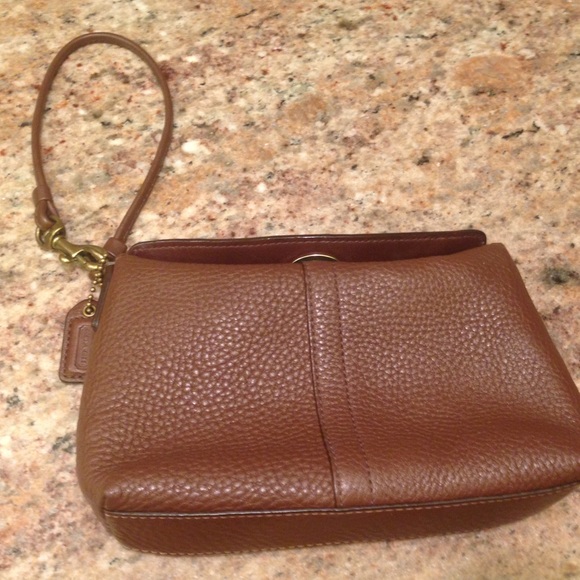 Coach wristlet in brown leather