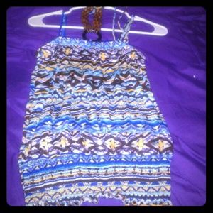 A brown/yellow hawian crop top