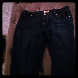 Dark wash skinny jeans sold