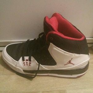 Red, black, and white Jordans