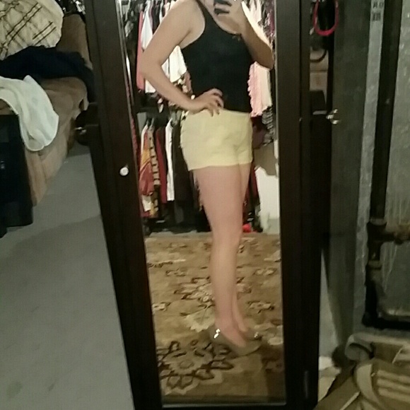 Pale yellow shorts