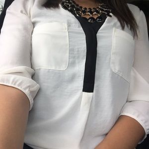 Cream and black blouse