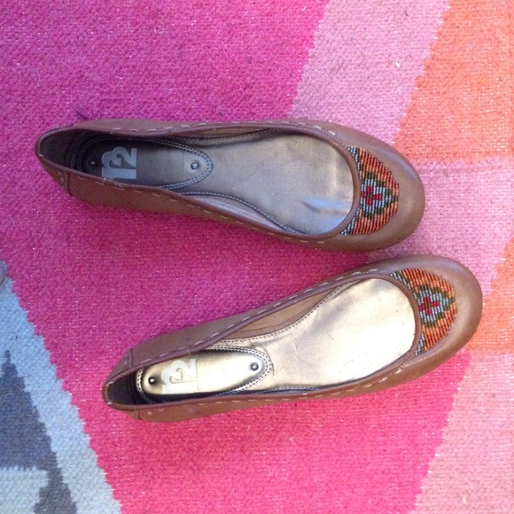 Brown leather and beaded flats. NWOT