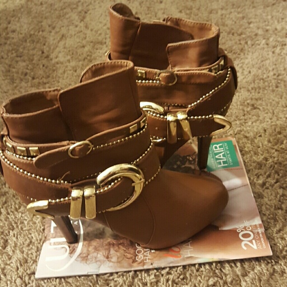 Brown and gold boots
