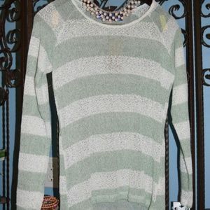 Sweater, green and white striped.