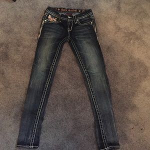 Dark wash pick rock rock revival skinnies