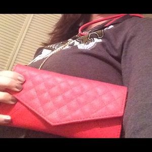 Cross body wristlet