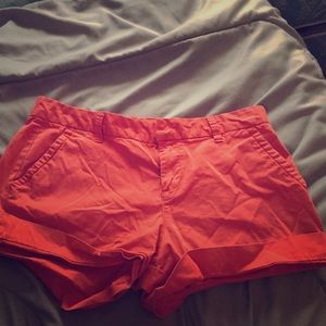 Orangish red colored shorts