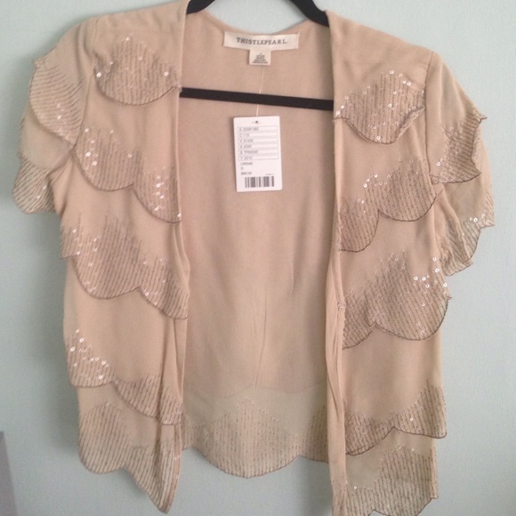 Creme colored short sleeved shawl