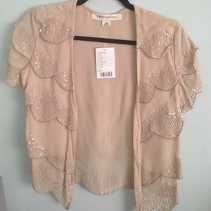 Creme colored short sleeved shawl