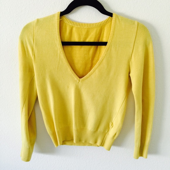 Mustard yellow revealing v-neck sweater