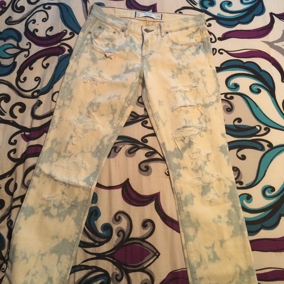 Acid wash distressed jeans