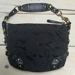 Coach Carly Black Hobo Bag with Brass Accents