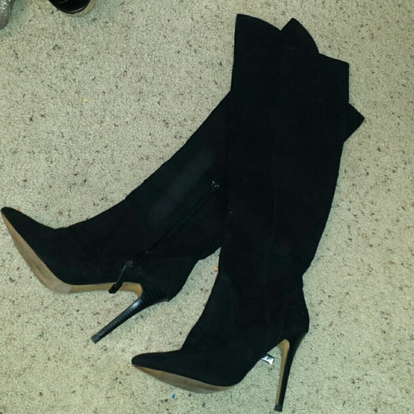 Tall black heeled boots