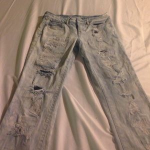 Light blue distressed skinny jeans