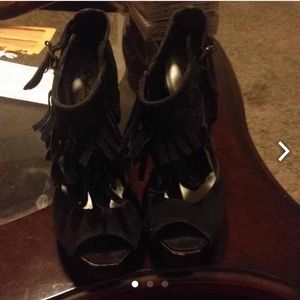 Black fringe heels