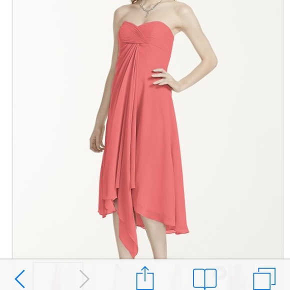 Worn once for a wedding. The color is coral reef