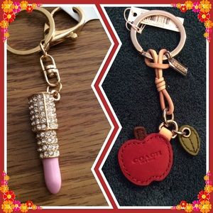 COACH and key fobs , one Apple, one lipstick