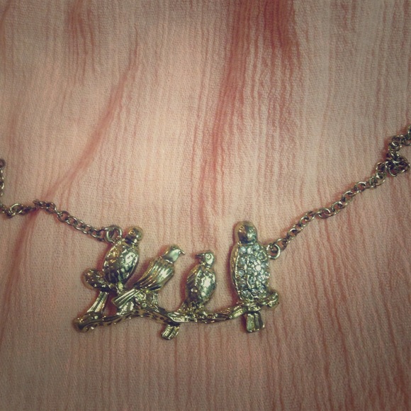 Gold bird necklace