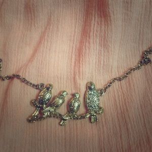 Gold bird necklace