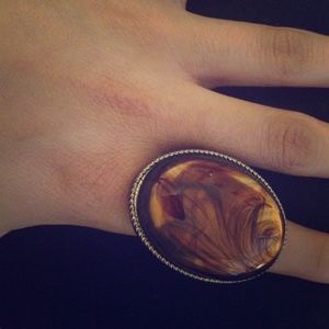 Large brown rock ring.