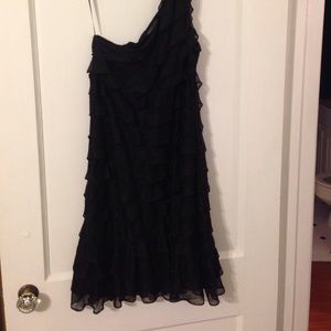 One shoulder ruffle little black dress.