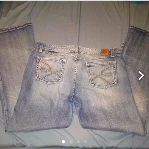 Women's buckle jeans