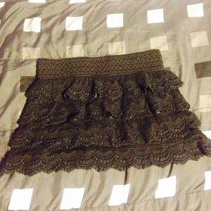 Black crochet mini skirt.
