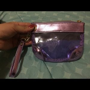 Small Versace perfume wristlet.