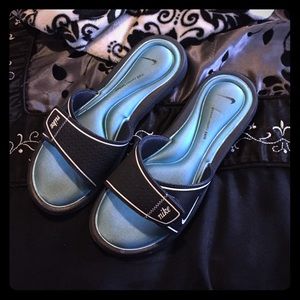 Blue Nike sandals