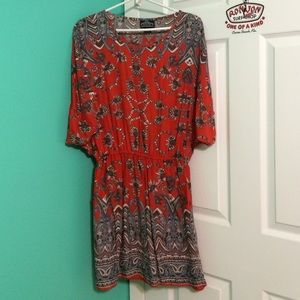 ORANGE DRESS & DESIGN