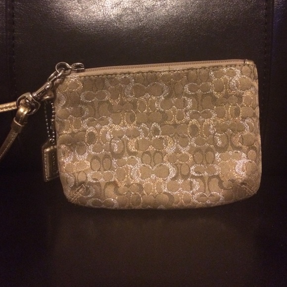 Gold coach wristlet