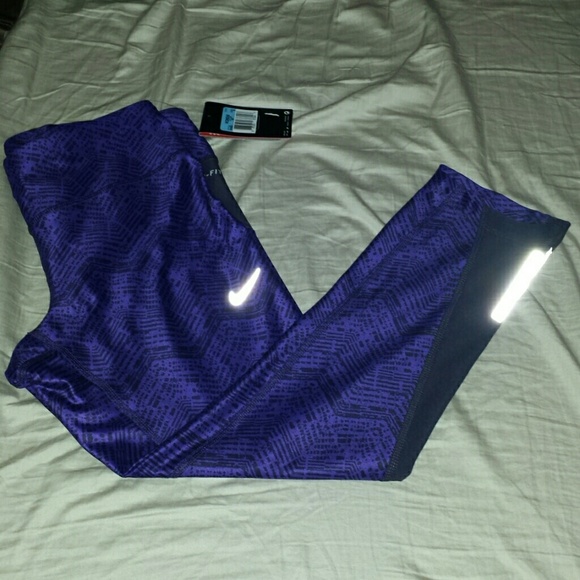Two New Nike dri-fit Capri length tights.
