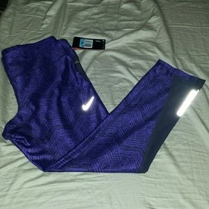 Two New Nike dri-fit Capri length tights.